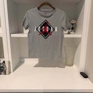 Jordan Light Gray Short Sleeve Graphic Tee with Red and Black Logo